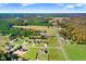 Aerial view of community with multiple homes and lots at 46 Otter Hole Dr, Princeton, NC 27569
