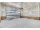 Spacious garage with polished concrete floor and ample storage at 46 Otter Hole Dr, Princeton, NC 27569