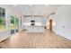 Modern kitchen with white cabinets and large island at 46 Otter Hole Dr, Princeton, NC 27569