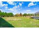 Spacious backyard with grassy area and gazebo at 46 Otter Hole Dr, Princeton, NC 27569