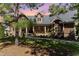 Two-story home with stone accents and a large front porch at 9 Mist Wood Court, Pittsboro, NC 27312