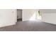 Spacious bonus room with grey carpet and an abundance of natural light at 9 Mist Wood Court, Pittsboro, NC 27312