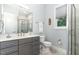 Clean bathroom with single vanity, shower, and toilet at 9 Mist Wood Court, Pittsboro, NC 27312