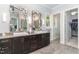 Elegant bathroom with double sinks, granite countertops, and a walk-in shower at 9 Mist Wood Court, Pittsboro, NC 27312
