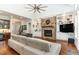 Open living space with stone fireplace and built-in shelving at 9 Mist Wood Court, Pittsboro, NC 27312
