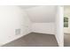 Versatile bonus room with grey carpet and ample space at 9 Mist Wood Court, Pittsboro, NC 27312