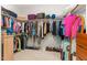 Large walk-in closet with ample shelving and hanging space at 9 Mist Wood Court, Pittsboro, NC 27312