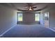 Spacious main bedroom with ceiling fan and en-suite bathroom at 194 Lotus Ave, Smithfield, NC 27577