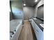 Bathroom boasts double vanity and a relaxing garden tub at 194 Lotus Ave, Smithfield, NC 27577