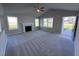 Spacious living room featuring a fireplace and vaulted ceiling at 194 Lotus Ave, Smithfield, NC 27577
