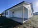 House exterior showcasing a covered patio at 194 Lotus Ave, Smithfield, NC 27577