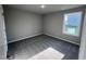 Well-lit bedroom featuring carpet and a window at 194 Lotus Ave, Smithfield, NC 27577