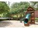 playground with a slide and swings at 129 Sturbridge Dr # 15, Clayton, NC 27520