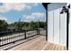 Spacious deck with views overlooking a residential street at 2401 E Main St, Durham, NC 27703