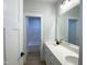 Modern bathroom with double vanity and shower at 114 Shoshone Dr, Louisburg, NC 27549