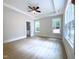 Main bedroom with access to en-suite bathroom and ample natural light at 114 Shoshone Dr, Louisburg, NC 27549