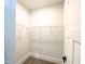 Spacious closet with wire shelving and hanging rods at 114 Shoshone Dr, Louisburg, NC 27549
