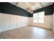 Spacious dining room featuring hardwood floors and a modern chandelier at 236 Abingdon Farms Dr, Selma, NC 27576