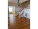 Elegant entryway with hardwood floors and a staircase at 110 S Layton Avenue, Dunn, NC 28334