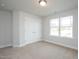 Spacious bedroom with double-door closet and window at 168 Newport Lndg, Garner, NC 27529