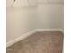 Large walk-in closet with carpeted flooring at 168 Newport Lndg, Garner, NC 27529