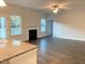 Spacious living room with hardwood floors, fireplace and ceiling fan at 168 Newport Lndg, Garner, NC 27529