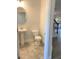 Convenient powder room with pedestal sink and toilet at 168 Newport Lndg, Garner, NC 27529