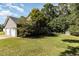Two-car garage with driveway and additional storage shed at 1001 Yopon Ct, Raleigh, NC 27603