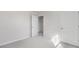Empty bedroom with neutral-colored carpet and white walls at 20 Charlies Bend Way, Spring Lake, NC 28390