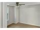 Spacious bedroom with neutral walls, ceiling fan, and carpeted floors at 7220 Shellburne Dr, Raleigh, NC 27612