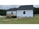 Exterior view of a single story home with a deck at 749 Sherrill Farm Dr, Benson, NC 27504