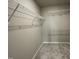 Large walk-in closet with wire shelving for storage at 749 Sherrill Farm Dr, Benson, NC 27504