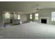 Spacious living room with high ceilings and a fireplace at 749 Sherrill Farm Dr, Benson, NC 27504