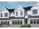 Modern farmhouse style townhome with two-car garage at 4038 Elk Creek Ln # 60, Raleigh, NC 27612