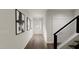 Spacious hallway with access to stairs and front door at 4038 Elk Creek Ln # 60, Raleigh, NC 27612