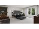 Spacious bedroom with large window and built-in shelving at 4038 Elk Creek Ln # 60, Raleigh, NC 27612