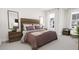 Cozy bedroom with a bed and built-in desk at 4038 Elk Creek Ln # 60, Raleigh, NC 27612