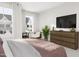 Spacious bedroom with a queen-size bed and dresser at 4038 Elk Creek Ln # 60, Raleigh, NC 27612
