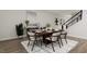 Elegant dining room with wooden table and modern chairs at 4038 Elk Creek Ln # 60, Raleigh, NC 27612