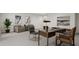 Modern home office featuring a glass-top desk and stylish chairs at 4038 Elk Creek Ln # 60, Raleigh, NC 27612