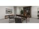 Bright home office with a large desk and comfortable seating at 4038 Elk Creek Ln # 60, Raleigh, NC 27612