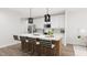 Modern kitchen with island, stainless steel appliances, and white cabinetry at 4038 Elk Creek Ln # 60, Raleigh, NC 27612