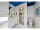 Modern bathroom with a glass-enclosed shower and mosaic tile accents at 3319 White Oak Rd, Raleigh, NC 27609