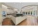 Large kitchen with island, granite countertops, and ample cabinetry at 3319 White Oak Rd, Raleigh, NC 27609
