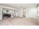 Open living room with kitchen and staircase views at 1109 Pale Moss Dr, Durham, NC 27704