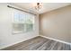 Bright office with large window and wood-look floors at 1109 Pale Moss Dr, Durham, NC 27704