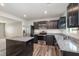 Modern kitchen with stainless steel appliances and granite counters at 1109 Pale Moss Dr, Durham, NC 27704