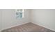 Bright bedroom with window and neutral decor at 1109 Pale Moss Dr, Durham, NC 27704