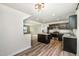 Modern kitchen with stainless steel appliances and granite counters at 1109 Pale Moss Dr, Durham, NC 27704