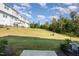 Sloped backyard with green space at 1109 Pale Moss Dr, Durham, NC 27704